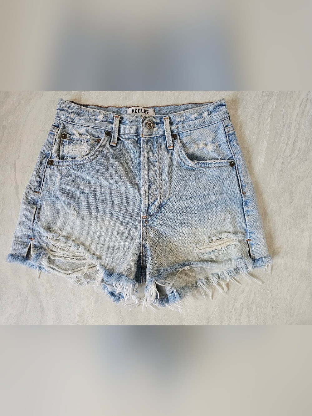 AGOLDE cut off denim shorts high rise with frayed hem and distressing